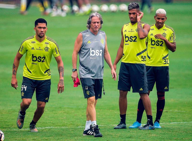 Flamengo manager Jorge Jesus, second left, with Vitor Gabriel, left, Rafael Santos, second right, and Joao Lucas in Rio de Janiero. AFP