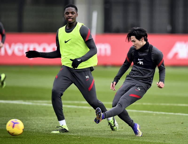 KIRKBY, ENGLAND - NOVEMBER 26: (THE SUN OUT, THE SUN ON SUNDAY OUT) Takumi Minamino and Billy Koumetio of Liverpool during a training session at AXA Training Centre on November 26, 2020 in Kirkby, England. (Photo by Andrew Powell/Liverpool FC via Getty Images)
