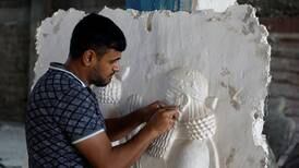 Mosul sculptor recreates what was demolished on murals depicting Iraqi history