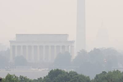 The Lincoln Memorial and Washington Monument in Washington are shrouded in haze. AFP