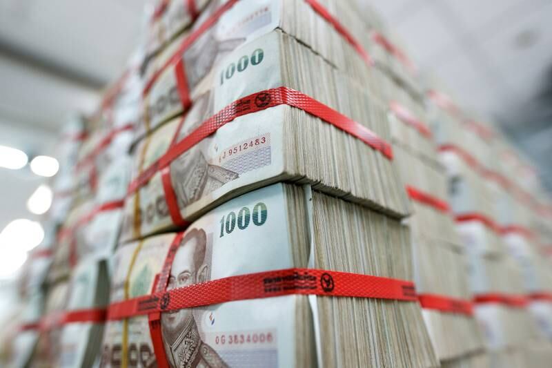 Thai baht notes are seen at a bank in Bangkok. The pandemic significantly reduced the use of cash payments in the Asia-Pacific, most notably in key markets like Thailand and Indonesia. Reuters