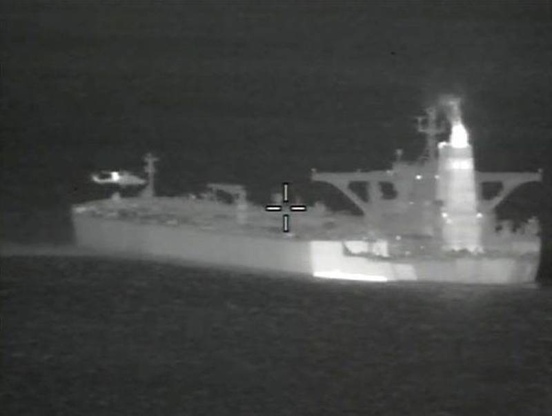 A handout picture provided by the British Ministry of Defence showing British Royal Marines  who took part in the seizure of Grace 1, an Iranian oil tanker in the Gibraltar Strait. EPA