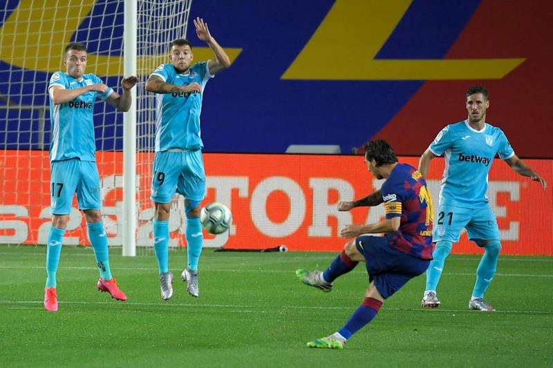 Lionel Messi attempts a free kick against Leganes. AFP