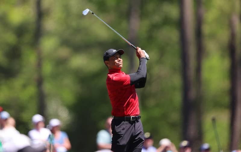 Tiger Woods hits his tee shot on the 12th hole during the final round of the Masters. EPA