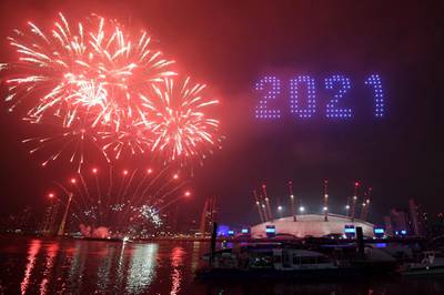 Fireworks and drones illuminate the night sky over London. AP Photo
