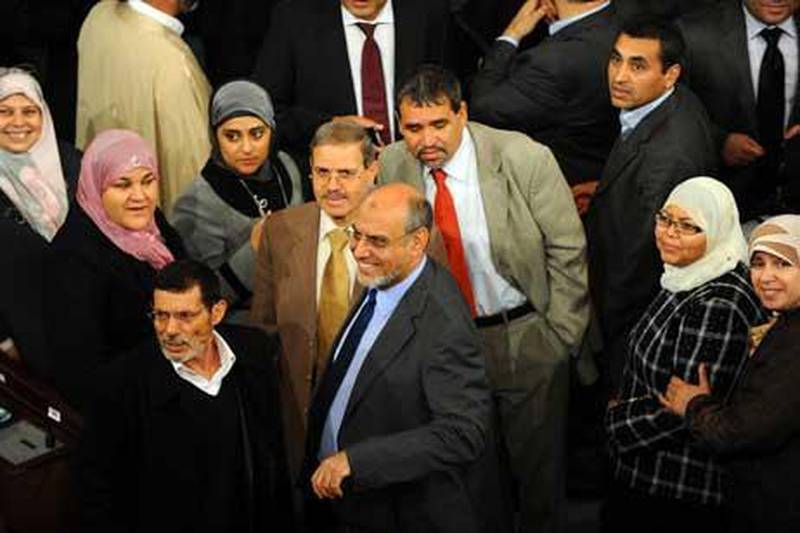 Tunisian Prime minister Hamadi Jebali (C) and Ennahdha Islamist deputies. The Ennahdha party has voted for laws which call women 'complementary' to men.