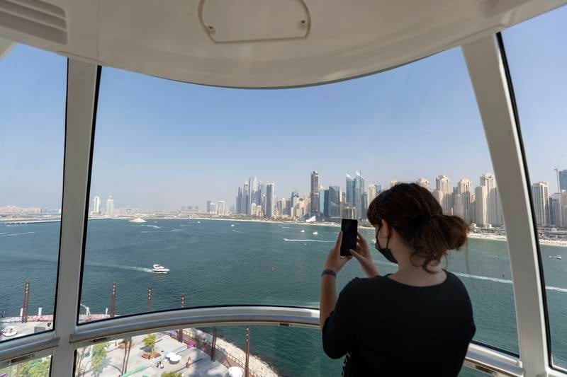 Guests can view Dubai Marina and Palm Jumeirah from the attraction's 48 cabins