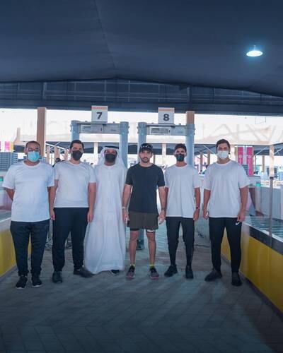 Sheikh Hamdan with Expo officials.