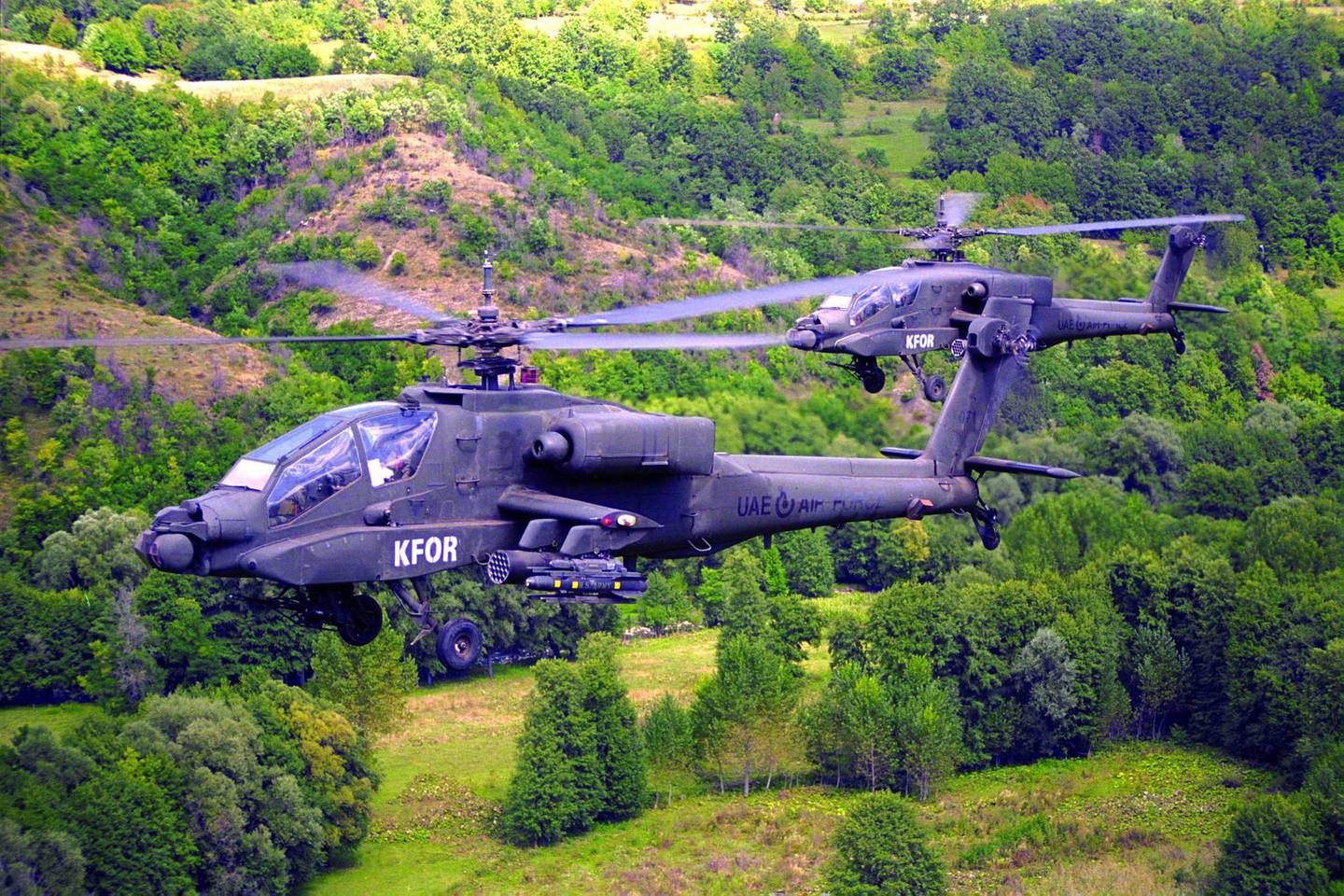 Two Emirati attack helicopters fly over the countryside bearing the Kfor markings of the Nato-led peacekeeping mission. Courtesy: Maj Gen Obaid Al Ketbi