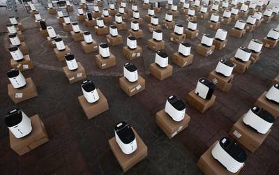 Rows of oxygen concentrators for COVID-19 patients sit in the main plaza of the Iztapalapa borough of Mexico City. AP Photo