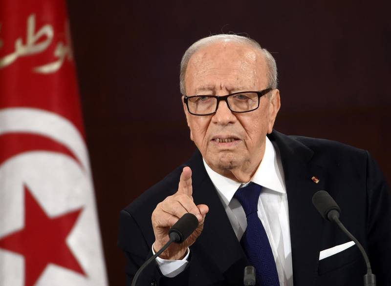 (FILES) In this file photo taken on March 20, 2015, Tunisian President Beji Caid Essebsi delivers a speech during a ceremony marking the 59th anniversary of Tunisia's independence at the Carthage palace in Tunis. Tunisia is not threatened by any power vacuum as President Beji Caid Essebsi remains in hospital after being taken ill, one of his advisors said on June 28, 2019 adding the veteran leader was in stable condition. / AFP / Fethi Belaid
