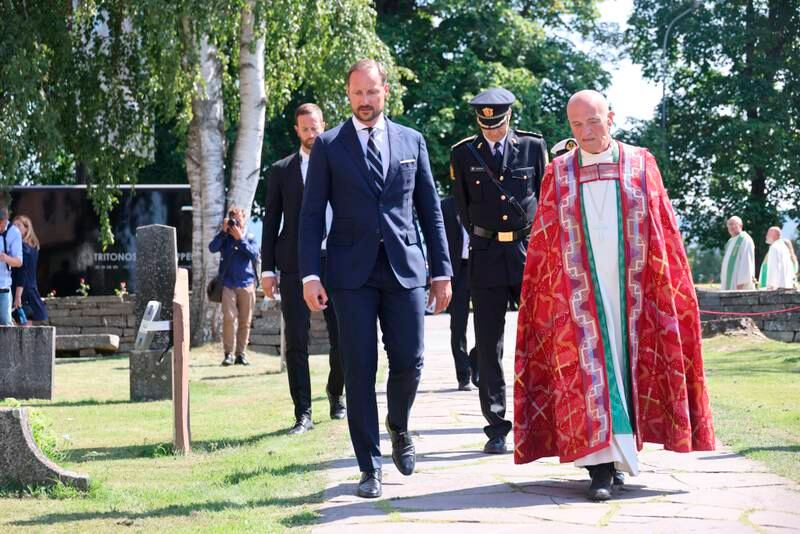 Crown Prince Haakon Magnus with Bishop Jan Otto Myrseth during the commemorative service in Hole Church. AP