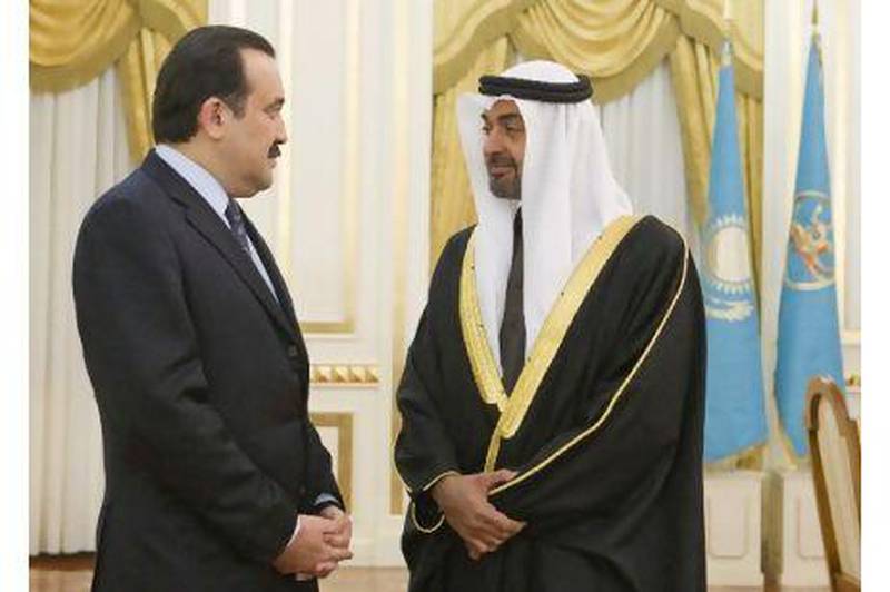 Sheikh Mohamed bin Zayed, Crown Prince of Abu Dhabi and Deputy Supreme Commander of the UAE Armed Forces speaks to Karim Massimov, the prime minister of Kazakhstan at the Presidential Palace.