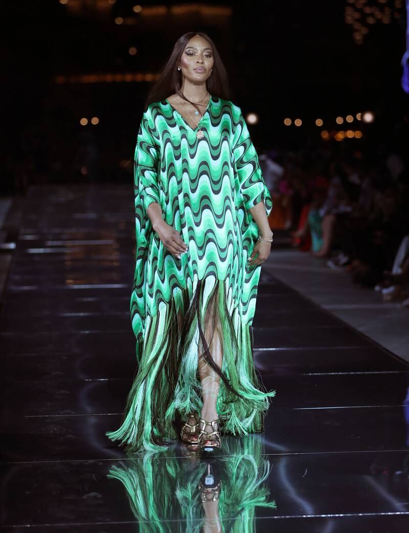 British model Naomi Campbell presents a creation by Banke Kuku. EPA