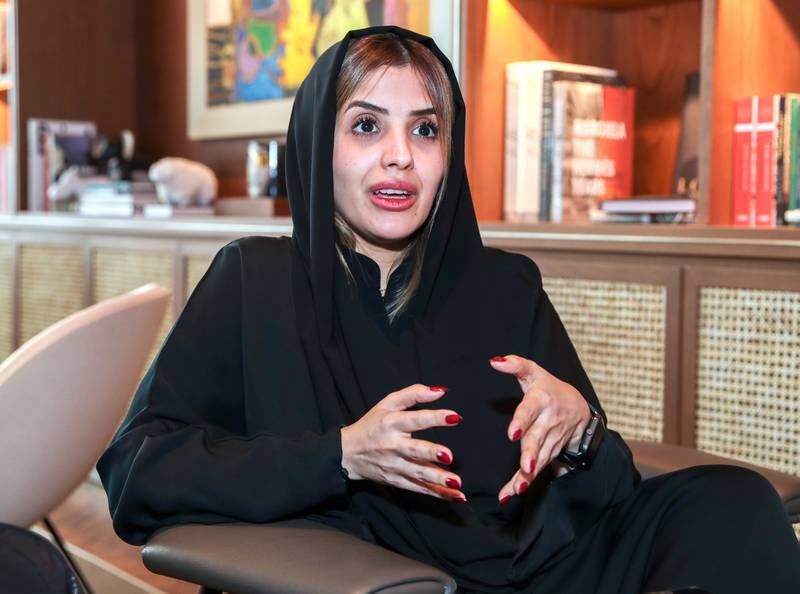 Sheikha Al Mheiri says she is proud to work at an Abu Dhabi mall. Victor Besa / The National
