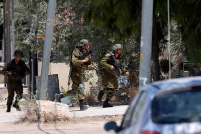 Israeli soldiers engage in a search operation for wanted Palestinians in the occupied West Bank village of Orif, south of Nablus. AFP
