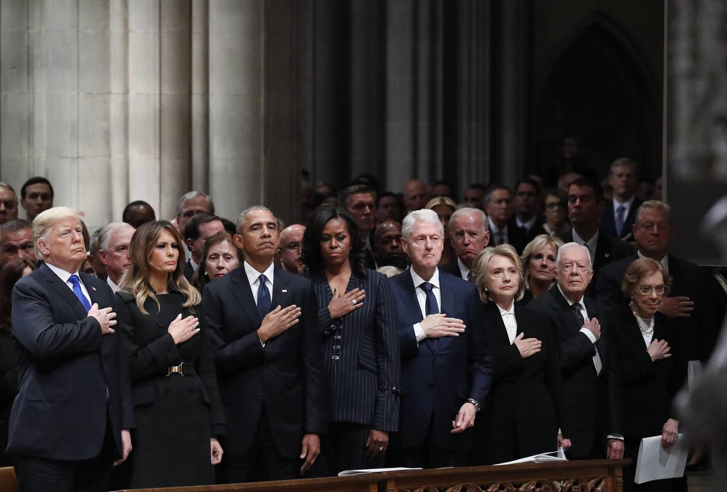 FILE: Bloomberg Best Of U.S. President Donald Trump 2017 - 2020: U.S. President Donald Trump, from left, U.S. First Lady Melania Trump, former U.S. President Barack Obama, former U.S. First Lady Michelle Obama, former U.S. President Bill Clinton, Hillary Clinton, former U.S. secretary of state, former U.S. President Jimmy Carter, and former U.S. First Lady Rosalynn Carter stand during a state funeral service for former President George H.W. Bush at the National Cathedral in Washington, D.C., U.S., on Wednesday, Dec. 5, 2018. Our editors select the best archive images looking back at Trump’s 4 year term from 2017 - 2020. Photographer: Alex Brandon/Bloomberg