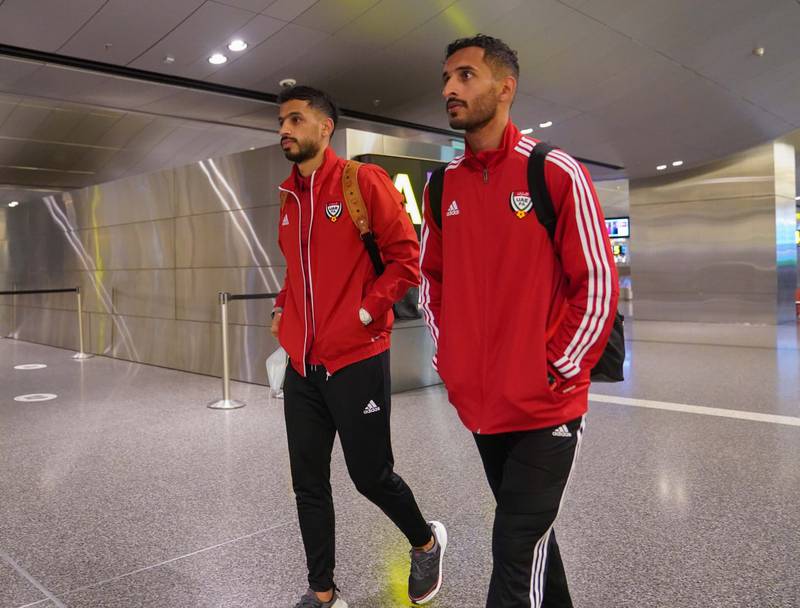 UAE players Ali Mabkhout, right, and Majed Hassan arrive in Doha ahead of their upcoming World Cup play-off against Australia. 