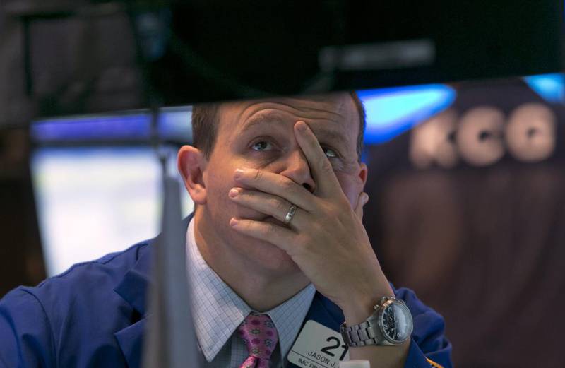 On the floor of the New York Stock Exchange, near the close of trading on Friday, October 10, 2014. US stocks closed out a turbulent week with another loss, giving the market its worst week since May 2012. Richard Drew / AP Photo