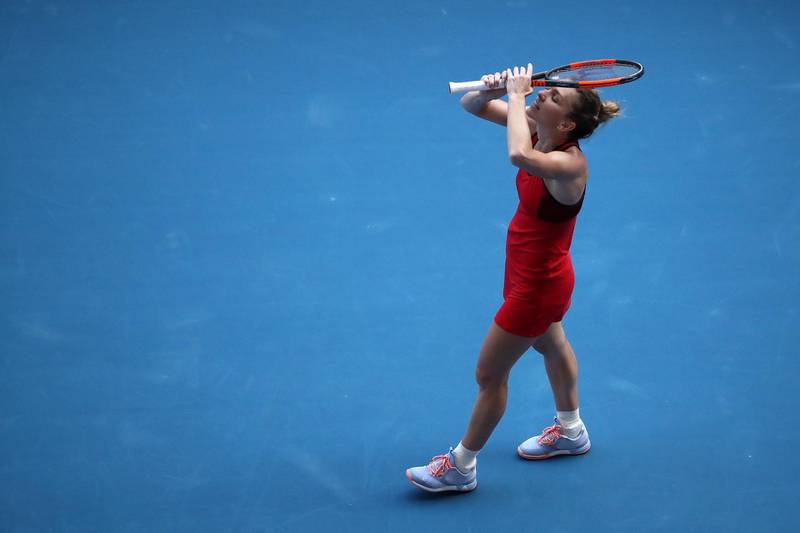 Simona Halep celebrates winning match point in her semi-final match against Angelique Kerber. Cameron Spencer / Getty Images