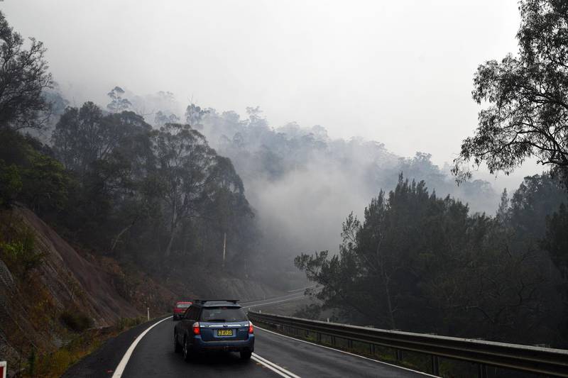 Approaching smoke from bushfires along Princes Highway between Batemans Bay and Nowra on Central Coast in Australia's New South Wales state.  AFP