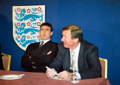 LONDON, UNITED KINGDOM - FEBRUARY 24:  Manchester United player Eric Cantona (l) and manager Alex Ferguson, pictured at an FA  disciplinary hearing after Cantona was sent off for kicking Crystal Palace player Richard Shaw and on his way back to the changing room he leapt over the barrier and attacked Palace fan Matthew Simmons, who had been using abusive language to the Frenchman, with a two-footed kung-fu type assault, at FA Headquarters on February 24, 1995 in London, England. (Photo by Allsport/Getty Images)