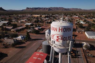 An aerial view shows the logo of the Van Horn Eagles football team on a water tower in Van Horn, Texas where- Blue Origin held several rocket launches last year. AFP