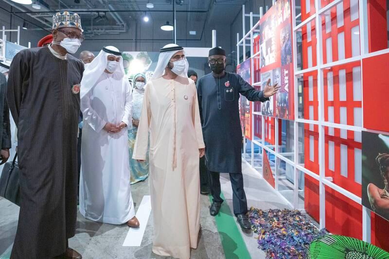Sheikh Mohammed bin Rashid, Vice President and Ruler of Dubai, with Nigerian President Muhammadu Buhari, left, at Expo 2020 Dubai on Saturday. All photos: Dubai Media office
