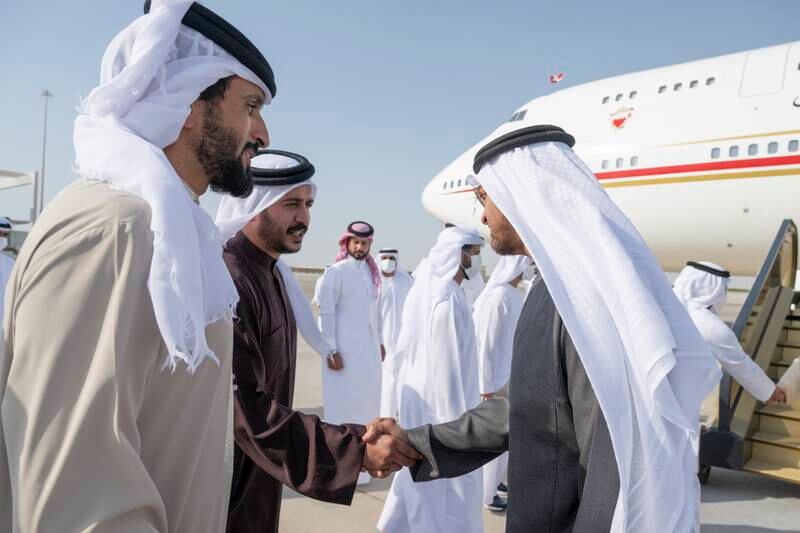 Sheikh Mohamed bin Zayed sees off Sheikh Khaled bin Hamad bin Isa Al Khalifah (second from left) and Sheikh Nasser bin Hamad bin Isa Al Khalifa (left) at the Presidential Airport. Mohamed Al Hammadi / UAE Presidential Court