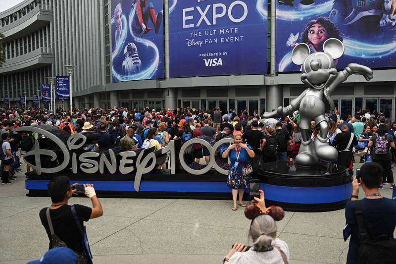 A statue of Mickey Mouse welcomes those attending Walt Disney D23 Expo. AFP