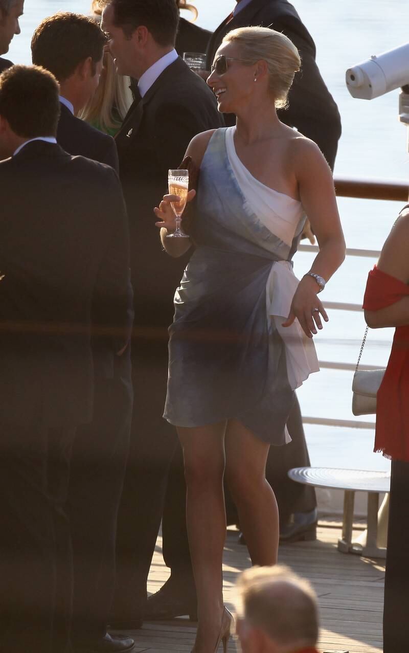 Zara Phillips, wearing a one-shouldered grey and white dress, celebrating at her pre-wedding party on the 'Royal Yacht Britannia' on July 29, 2011 in Edinburgh, Scotland. Getty Images