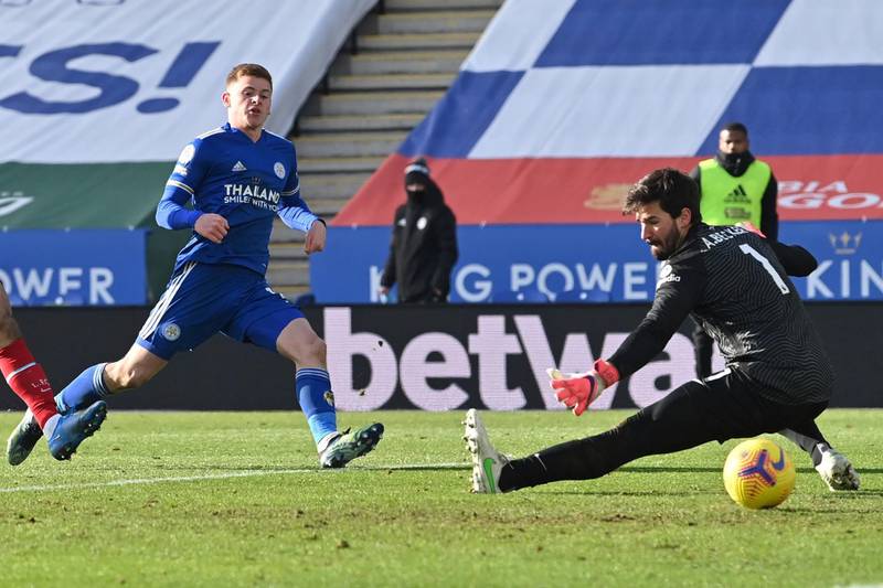 Leicester's Harvey Barnes, left, scores his side's third goal against Liverpool at the King Power Stadium on Saturday. AP