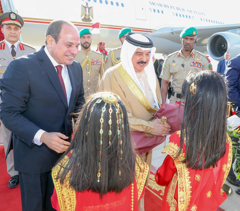 King Hamad receives Mr El Sisi at Bahrain's Sakhir Air Base. Reuters