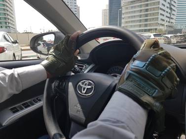The driving gloves are becoming popular with Abu Dhabi drivers. Picture by Saeed Saeed