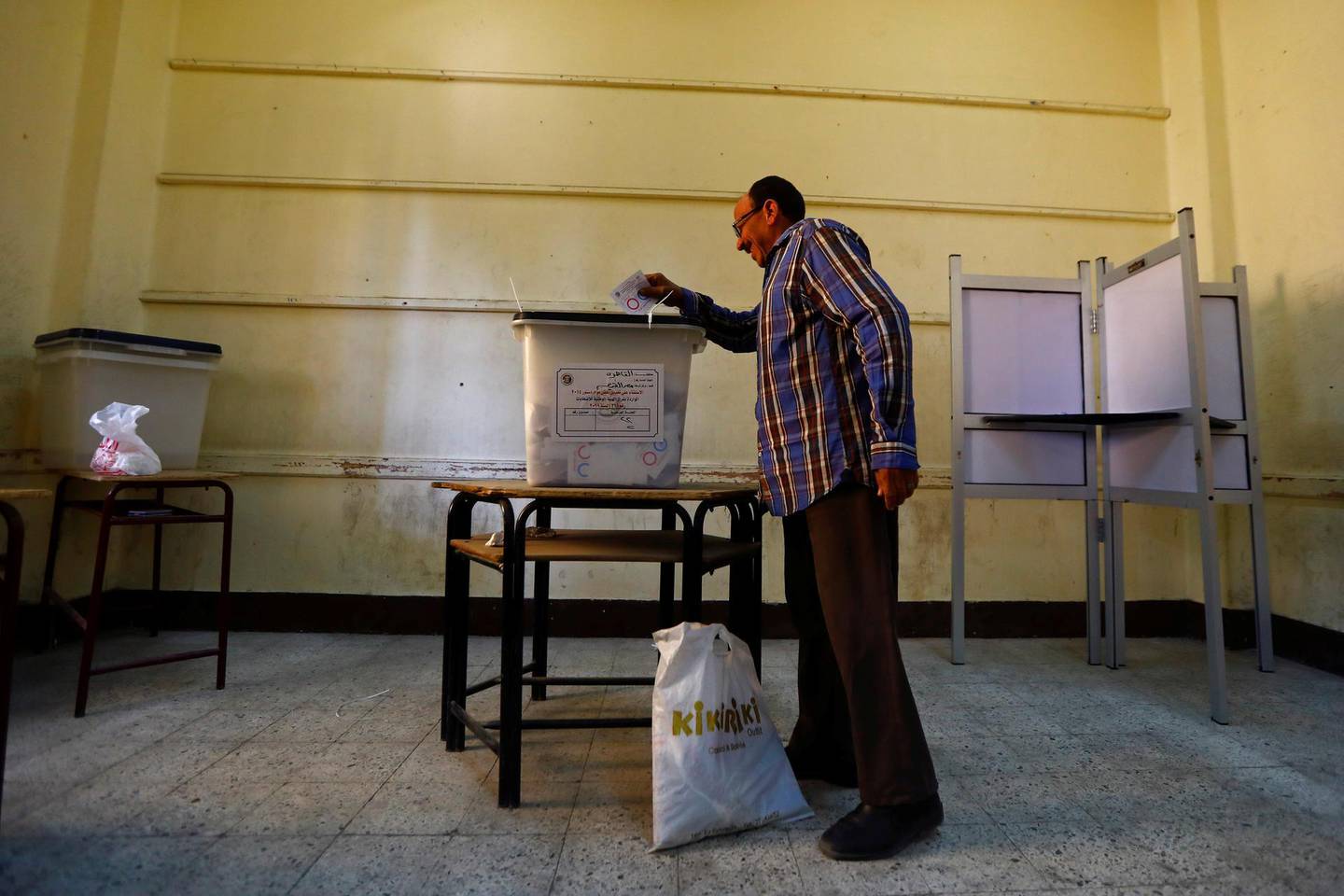 A man casts his vote during the second day of the referendum on draft constitutional amendments, at a polling station in Cairo, Egypt April 21, 2019. REUTERS/Amr Abdallah Dalsh