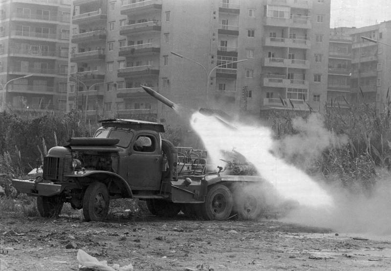 A katyusha rocket is fired from the back of an army truck into an apartment complex during the Lebanese Civil War, Lebanon, probably 1975. The war, which lasted until 1990, was fought between a bewildering array of sectarian, ideological, and foreign armed factions in continuously shifting alliances. Most prominent were the rightist Maronite Christian Phalangists, the secular Palestinian PLO, the Israelis, the Syrians, the Druze, the Shiite Amal, and Hezbollah. (Photo by Express/Getty Images)