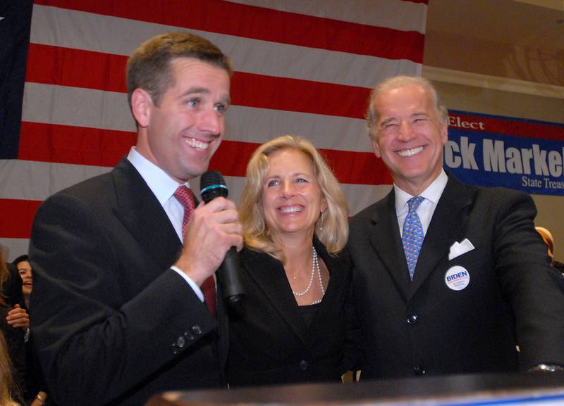 Mr Biden and his wife Jill celebrating their son Beau's election as attorney general of Delaware. AP