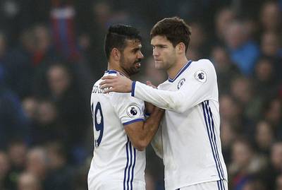 Chelsea’s Diego Costa shakes Marcos Alonso’s hand as he is substituted off. Peter Nicholls / Reuters