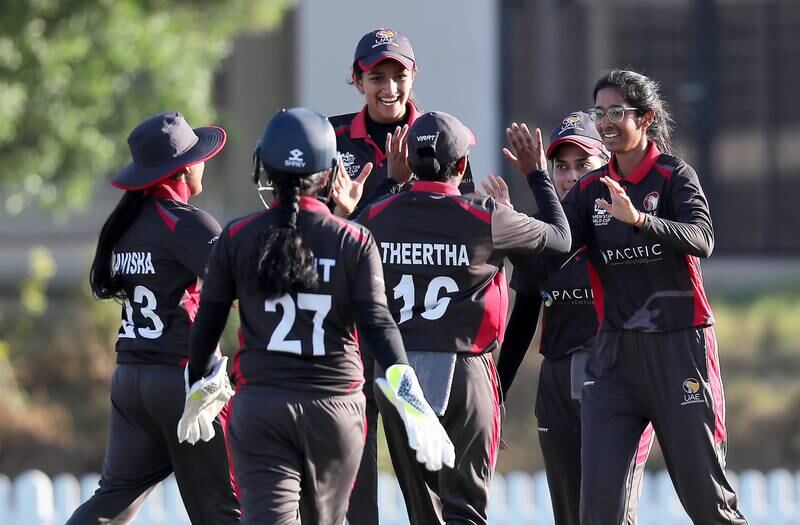 UAE's Khushi Sharma of UAE, right, up five wickets against Bhutan in their Women's T20 World Cup Asia region qualifier at the ICC Academy in Dubai on Thursday, November 25, 2021. Pawan Singh / The National
