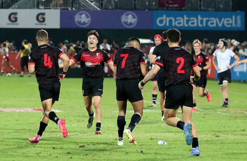 Players of DESC celebrate after winning the Gulf Under 19 boys cup final at The Sevens stadium on the second day of the Emirates Dubai Rugby Sevens series.