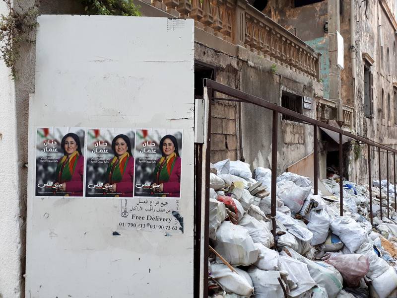 <p>Posters hang on the walls amid the rubbish in Basta, Beirut India Stoughton