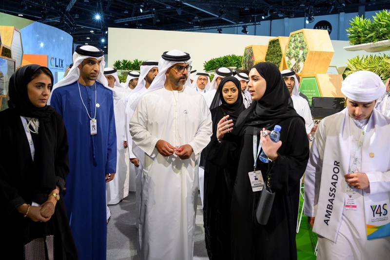 ABU DHABI, UNITED ARAB EMIRATES - January 16, 2019: HH Sheikh Hamed bin Zayed Al Nahyan, Chairman of the Crown Prince Court of Abu Dhabi and Abu Dhabi Executive Council Member (3rd L), at the Climate Innovation Exchange (CLIX) stand, while touring World Future Energy Summit, part of Abu Dhabi Sustainability Week 2019, at the Abu Dhabi National Exhibition Centre (ADNEC). Seen with HE Dr Thani Al Zeyoudi, UAE Minister for Climate Change and Environment (2nd L).

( Saeed Al Neyadi / Ministry of Presidential Affairs )
---