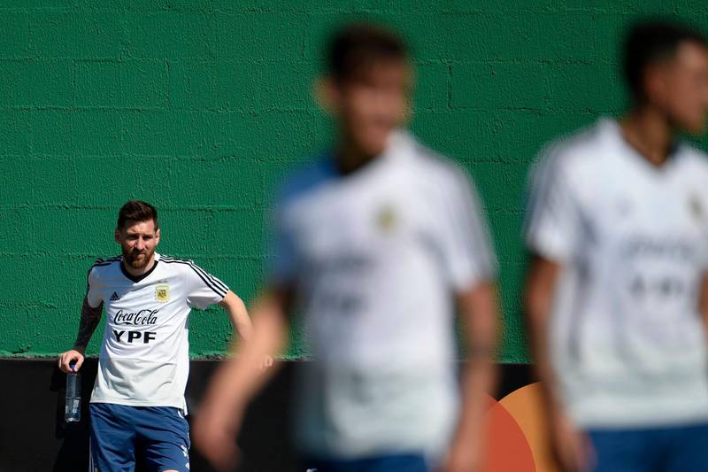Argentina'sLionel Messi watches his teammates during a training session in Rio de Janeiro. AFP