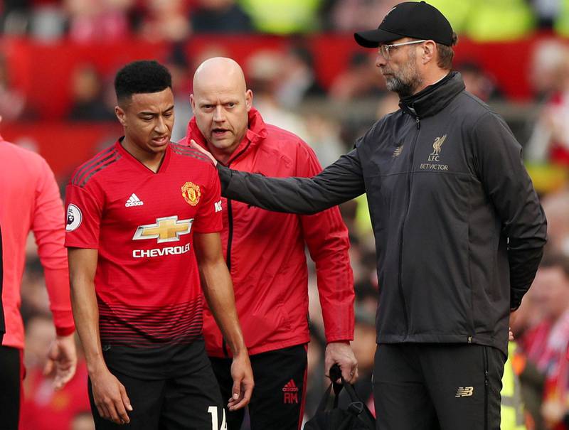 Soccer Football - Premier League - Manchester United v Liverpool - Old Trafford, Manchester, Britain - February 24, 2019  Manchester United's Jesse Lingard with Liverpool manager Juergen Klopp as he is substituted off  Action Images via Reuters/Lee Smith  EDITORIAL USE ONLY. No use with unauthorized audio, video, data, fixture lists, club/league logos or "live" services. Online in-match use limited to 75 images, no video emulation. No use in betting, games or single club/league/player publications.  Please contact your account representative for further details.