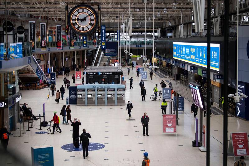 Commuters in Waterloo Station during the morning rush hour in London. AP Photo