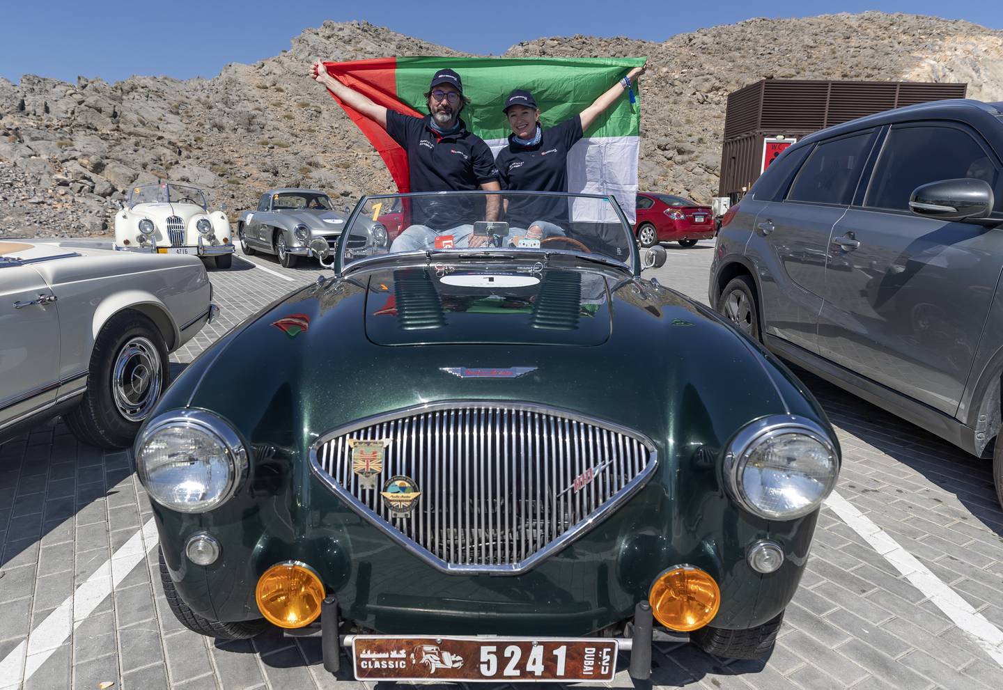 Anne Wencelius and Suphi Koseoglu with an Austin Healey 100 BN1 1954 at the top of Jebel Jais in Ras Al Khaimah. Chris Whiteoak / The National