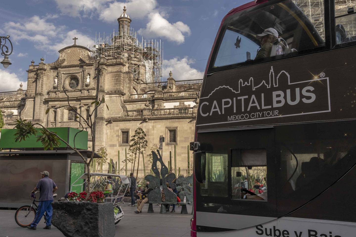 A double-decker tour bus travels in Mexico City. Photo: Bloomberg