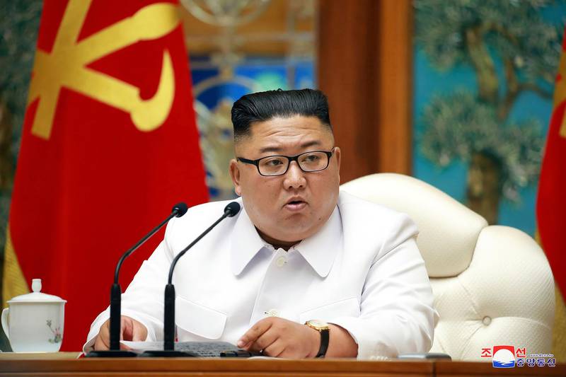In this photo provided by the North Korean government, North Korean leader Kim Jong Un attends an emergency Politburo meeting in Pyongyang, North Korea Saturday, July 25, 2020. Independent journalists were not given access to cover the event depicted in this image distributed by the North Korean government. The content of this image is as provided and cannot be independently verified. Korean language watermark on image as provided by source reads: "KCNA" which is the abbreviation for Korean Central News Agency. (Korean Central News Agency/Korea News Service via AP)