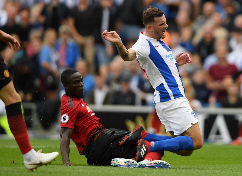 Manchester United defedner Eric Bailly of tackles Pascal Gross. Getty Images
