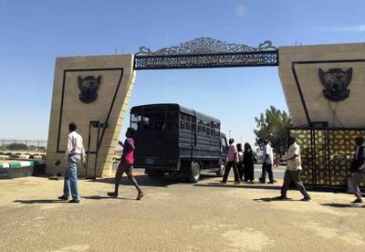 Sudanese police arrive at Khartoum airport. AFP